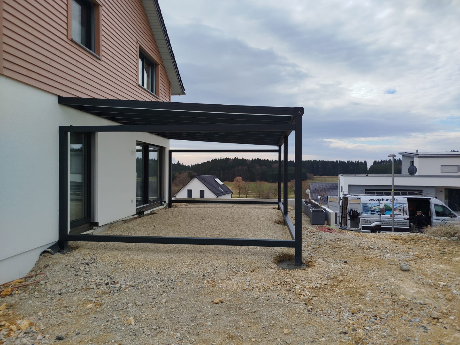 Terrassenüberdachung Königsheim aus Glas und Aluminium mit Wintergartenvorbereitung